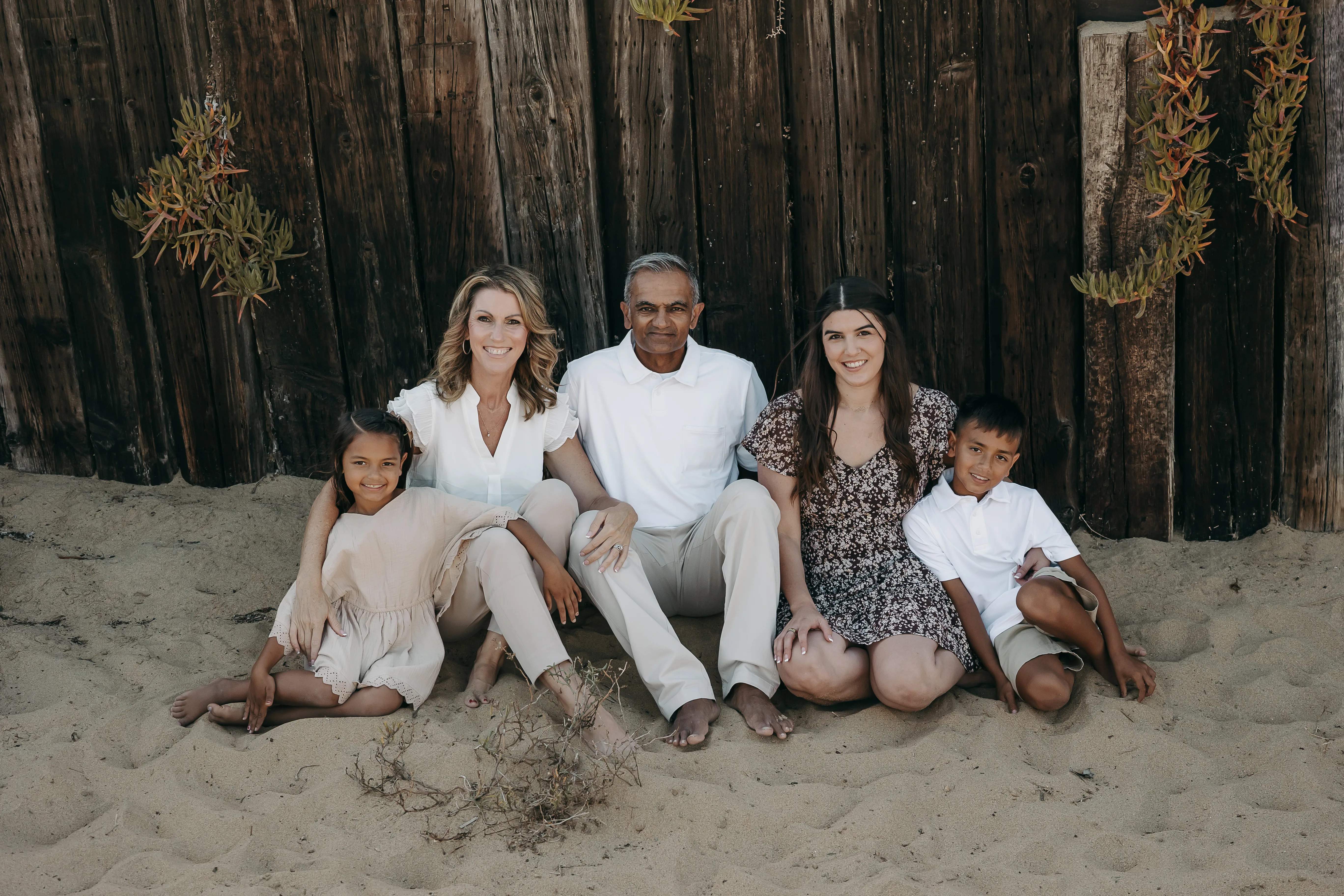 Lynnette Jaiswal with her family on the beach in San Diego